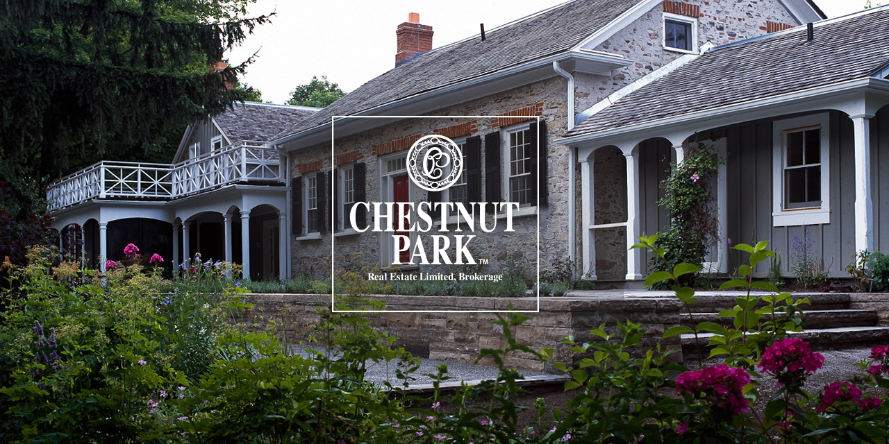 Beautiful stone house with Chestnut Park Logo overlayed on top of it